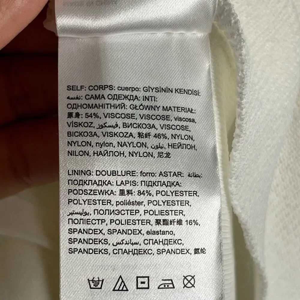 NWT Bebe White Bodycon Scalloped Neckline Mesh Ruffled Diagonal Bottom Dress XS - Picture 9 of 9